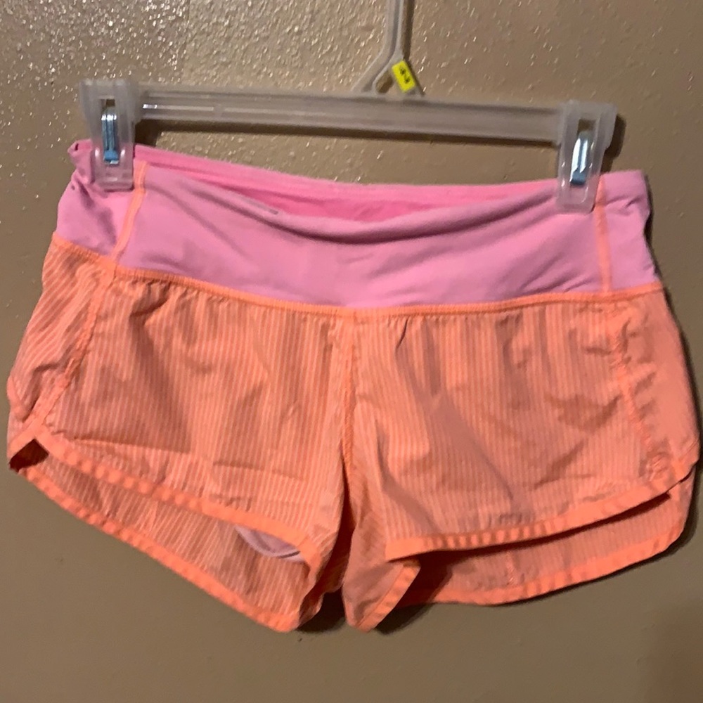 Lululemon pink orange striped shorts 2 flaws